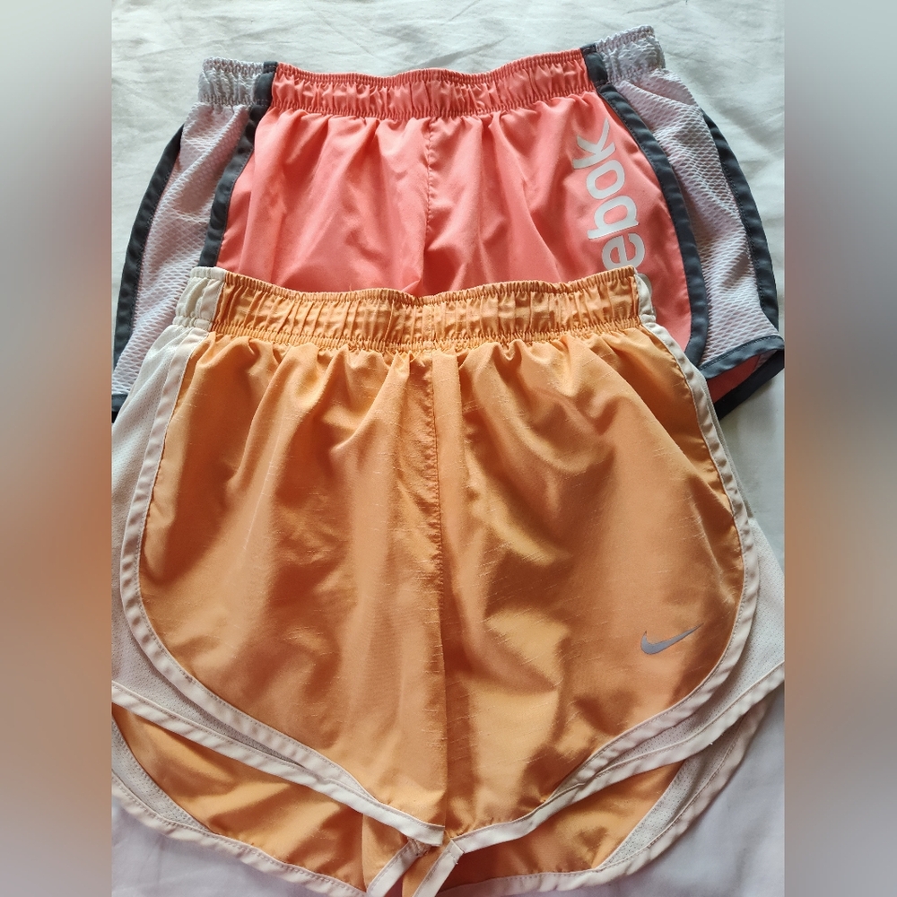 NIKE/REEBOK Shorts (2pr) Size XS. Both Lined Inside.  Drawstring Elastic Waist.